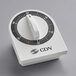 A white CDN kitchen timer with black numbers on the dial.