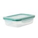 An OXO Smart Seal plastic container with a green lid.