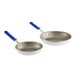 Two silver Vollrath Wear-Ever frying pans with blue Cool Handles.