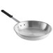 A Vollrath Arkadia aluminum fry pan with a black silicone handle.