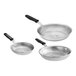 A group of Vollrath Wear-Ever aluminum frying pans with black silicone handles.