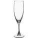 An Arcoroc Romeo champagne flute with a long stem and clear glass.