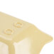 A white rectangular melamine display tray with scalloped edges.