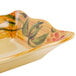 A rectangular Venetian scalloped melamine display tray with a floral design.
