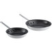 A pair of Vollrath Arkadia aluminum non-stick frying pans.