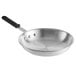 A Vollrath Arkadia aluminum frying pan with a black silicone handle.