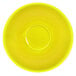 A close-up of a yellow International Tableware Cancun saucer with a circle in the middle.