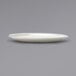 An ivory stoneware platter with a blue speckled rim and blue bands on the edges.