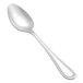 A Vollrath stainless steel dessert spoon with a brocade handle.