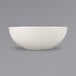 An ivory stoneware bowl with a wide rim.