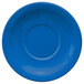 A light blue stoneware saucer with a circle in the middle.