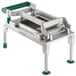 A Garde metal chicken slicer with green handles.