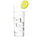 An Arcoroc highball glass filled with water, ice, and a slice of lime.