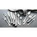 A close-up of a Vollrath Queen Anne stainless steel teaspoon.