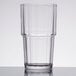 An Arcoroc stackable beverage glass with a rim.