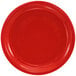 A red plate with a narrow white rim.