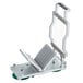 A Garde cheese slicer with a metal frame and a green handle.