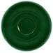 A green saucer with a circle in the middle.