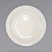A close-up of an International Tableware Valencia ivory saucer with a narrow rim.