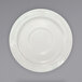 An International Tableware Newport ivory stoneware saucer with an embossed rim.