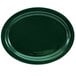 A dark green oval platter with a black rim.