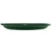 A green International Tableware stoneware platter with a narrow rim.