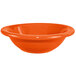 An orange bowl with a white background.