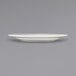 A close up of an International Tableware Roma ivory stoneware plate with a wide rim.