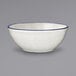 An International Tableware Danube stoneware bowl with a white base and blue rim.