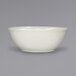 a white bowl on a gray background