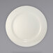 A white International Tableware stoneware plate with a wide circular rim.