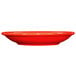 A red saucer with a white background.