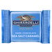 A blue package of Ghirardelli Dark Chocolate Sea Salt Caramel Squares.