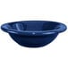 A International Tableware cobalt blue stoneware bowl with a curved edge.