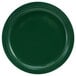 A close-up of a green International Tableware Cancun stoneware plate with a narrow rim.