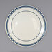 An ivory stoneware plate with blue bands.