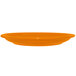 an orange plate on a white background