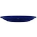An International Tableware cobalt blue stoneware plate on a white background.