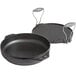 A Lodge pre-seasoned cast iron skillet with a handle.