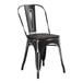 A black Lancaster Table & Seating metal cafe chair with a black wood seat.