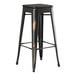 A Lancaster Table & Seating black metal barstool with black wood seat.