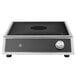 A stainless steel Vollrath countertop induction range with black knob controls.