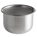 A stainless steel Vollrath mixing bowl with a rim.