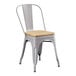 A Lancaster Table & Seating gray metal chair with a natural wood seat.