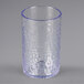 A Carlisle clear plastic tumbler with a blue rim.