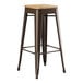 A brown Lancaster Table & Seating backless barstool with a natural wood seat.