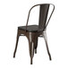 A brown metal Lancaster Table & Seating chair with a black seat.