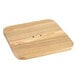 A Lancaster Table & Seating backless counter height stool with a natural wood seat and holes in it.