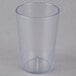 A Carlisle clear plastic tumbler on a white surface.