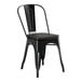 A black Lancaster Table & Seating metal cafe chair with a black wood seat.